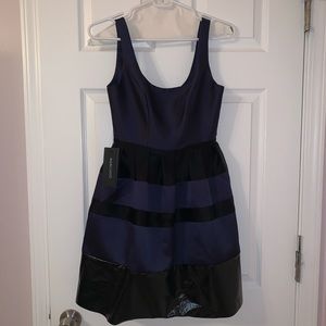 Navy and Black Marciano dress. SZ 0. NWT